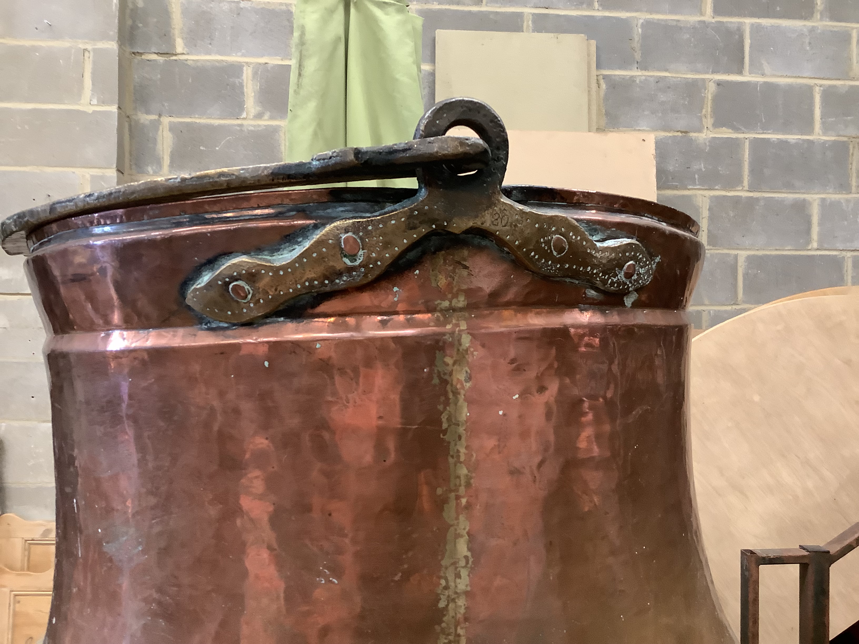 A large Eastern copper and brass cauldron, diameter 46cm, height 38cm